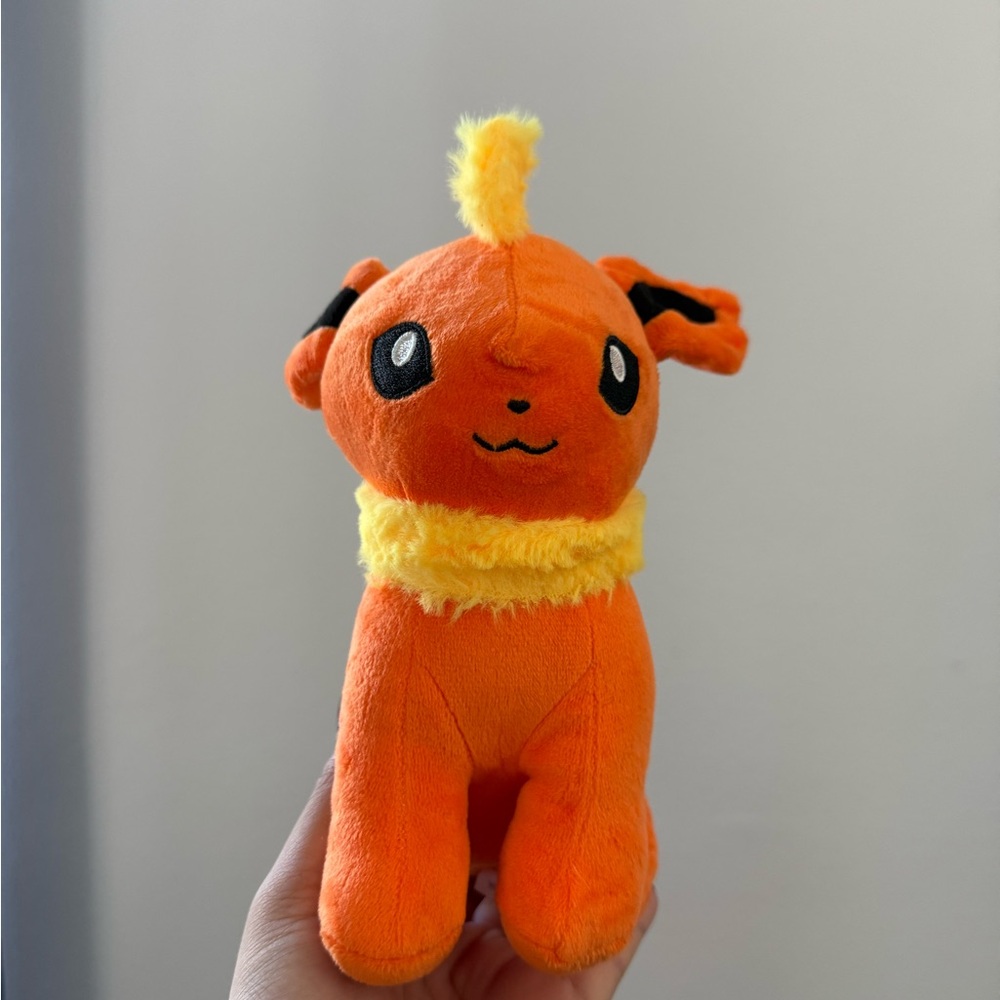 Orange Plush Toy with Yellow Accents